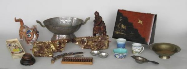 19 Miscellaneous Japanese and Chinese items: 19 Miscellaneous Japanese and Chinese items- a Chinese stuffed foo dog; 2 dragon wood carvings, an incised brass footed bowl, a small bowl, a carved wood figure of old man on horse back, a hinged dish
