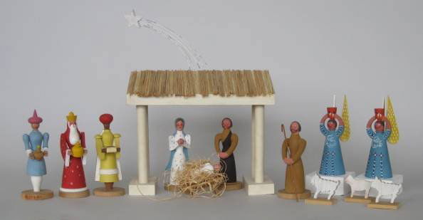 Portuguese Nativity figures: Portuguese Nativity figures, c. 1950's, along wtih an American 1950's Nativity stable set, painted wood and straw, wood, one of angel wings broken off, area of loss on straw roof, otherwise good condi