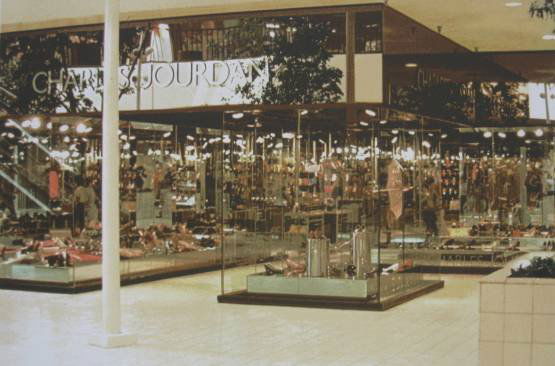 Tom Blackwell silkscreen: Tom Blackwell- ''Charles Jourdan Galleria''- silkscreen in colors, signed and numbered 204/250 in pencil. 16 1/2 x 24 1/2''