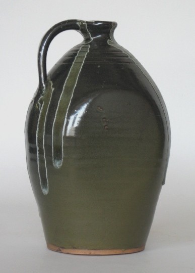Charles Lisk pottery vessel: Charles Lisk (American 1952- )- Jug- pottery vessel with flattened sides, 1 handle, signed 'Charles Lisk / Vale NC' on bottom. 12''h
