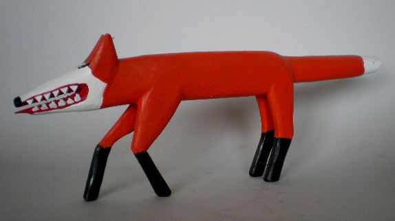Minnie and Garland Adkins wood sculpture: Garland Adkins (American 1928-1998) & Minnie Adkins (American 1934- )- Red Fox- painted wood sculpture, 1993, signed and dated on bottom. 9''h, 24''l
