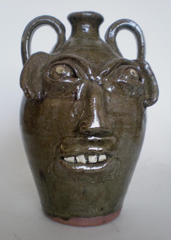 B. B. Craig ceramic sculpture: B. B. Craig (American 20th c.)- Face Jug- ceramic sculpture, ca. 1980's, stamped 'B. B. Craig / Vale N. C.' on bottom, signed 'B. B. Craig' back. 13 1/4''