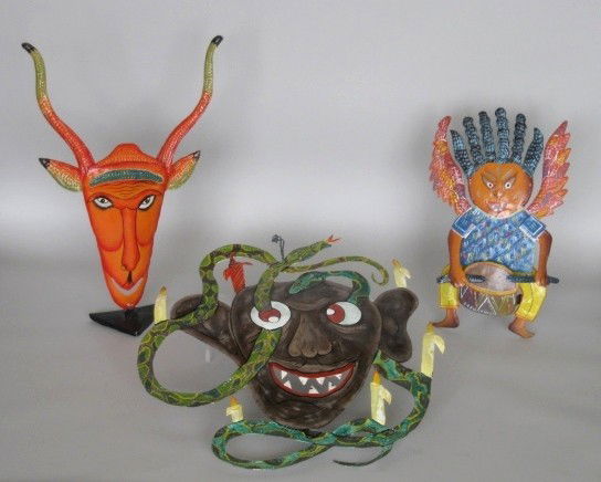E. Christobal iron cut-outs: E. Chrsitobal (Haitian 20th c.)- Face with Snalkes and Canldes; Drumming Angel and Animal Face- 3 painted iron cut-outs, ca. 1990's, one is signed, good condition. 17- 22''h