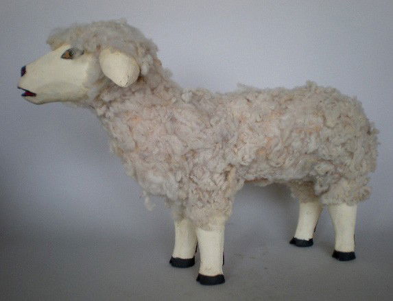 Leroy Archuleta wood sculpture: Leroy Archuleta (American 20th c.)- Lamb- wood sculpture, 1992, painted with natural white wool, signed and dated on bottom. 19''h, 29''l