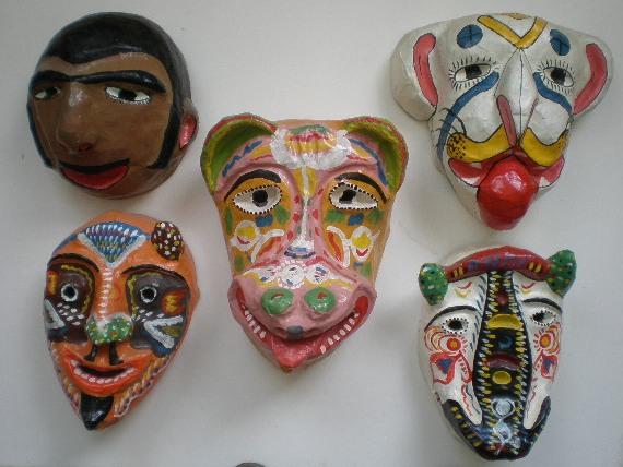 20th c. Haitian 5 papier mache masks: 20th c. Haitian 5 papier mache masks- Michel Sinvel (2)- Cows; R. Lambere- Tiger; Dume Gerard- Man; Unknown- El Diablo- 4 signed, overall good condition. various sizes