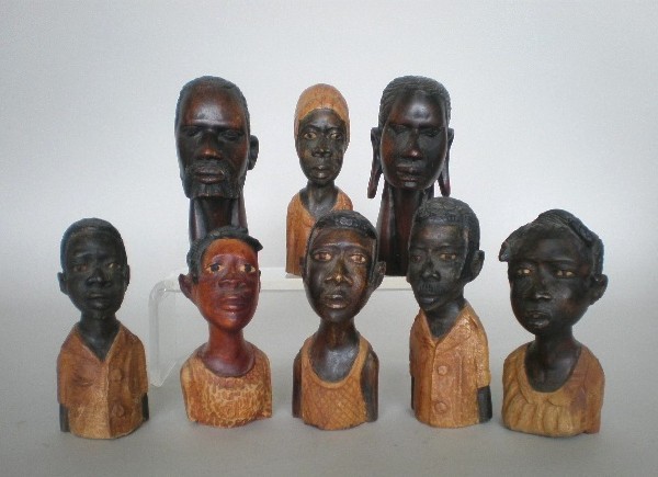 8 Mahogany busts by Emile Jean Louis and others: Emile Jean Louis (Haitian 20th c.)- 6 Mahogany busts, all signed; along with 2 mahogany busts, unsigned; good condition. various sizes