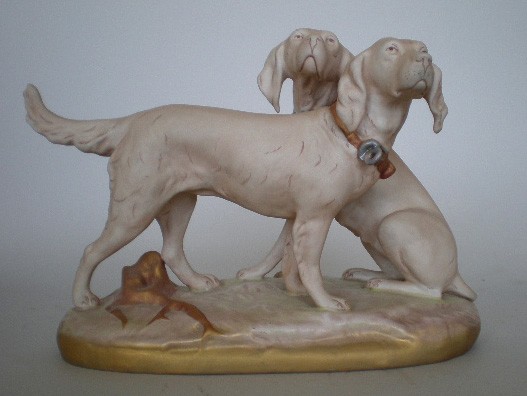 Royal Dux porcelain figurine: Royal Dux porcelain figurine- Setter and Pointer- marked 'Royal Dux Made in Czechoslovakia', pink triangle and number. 10 1/2''h
