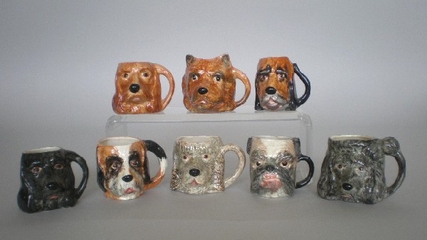 Lancaster & Sandland 8 Tobies: Lancaster & Sandlan 8 Tobies in forms of Dog Heads- 3 Spaniels; Poodle; Bulldog; St. Bernard; Blood Hound; Chow- all marked on bottom 'Lancaster & Sandland, hand painted in England', some crazing, oth