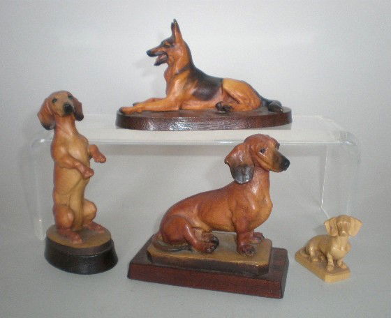 4 Anri caned wood Dogs: 4 Anri caned wood Dogs- 3 Dachshunds and 1 German Shepherd. 1 7/8'' to 4 3/4''