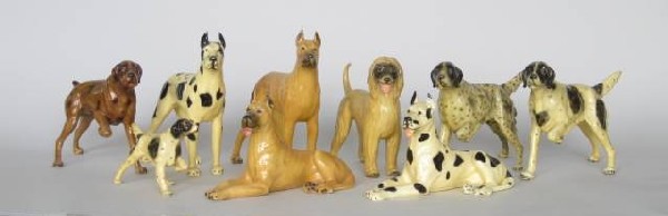 9 Morten Studio porcelain figurines: 9 Morten Studio porcelain figurines- Hound- Afghan Hound; Working Group- 4 Great Danes; Sporting Group- 3 English Setters; and a German Shorthaired Pointer- all stamped and/or labeled with stickers, v