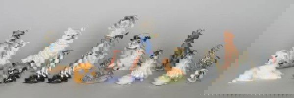 10 Porcelain Dog figurines: 10+ Porcelain Dog figurines- 2 Cappe- Dachshund on Pillow, and Dog with Butterfly on Head; Cybis- ''Mick, The Melodious Mutt''; Boehm- Poodle; a bisque Dog Nodder; a match holder with striker in form