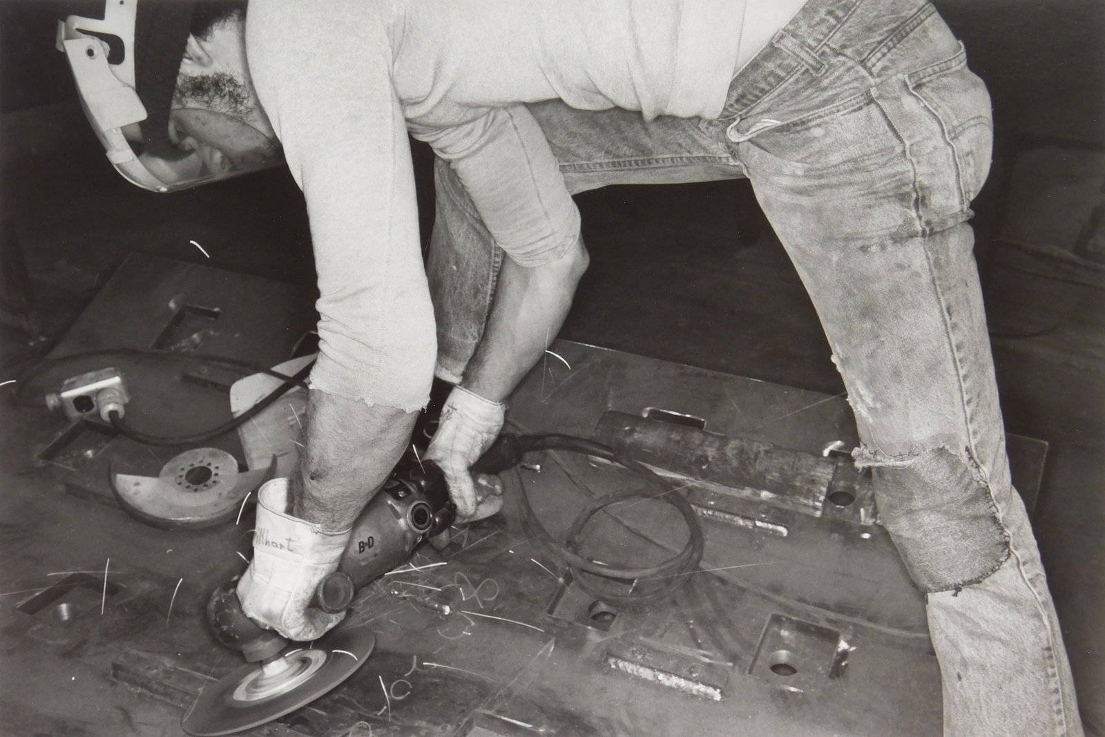 Lee Friedlander photograph: Lee Friedlander (American 1934- ) ''A Machine Shop, Akron, OH''- gelatin silver print, 1979-80, signed in pencil with copyright stamp- verso, very good condition. 11 x 14''