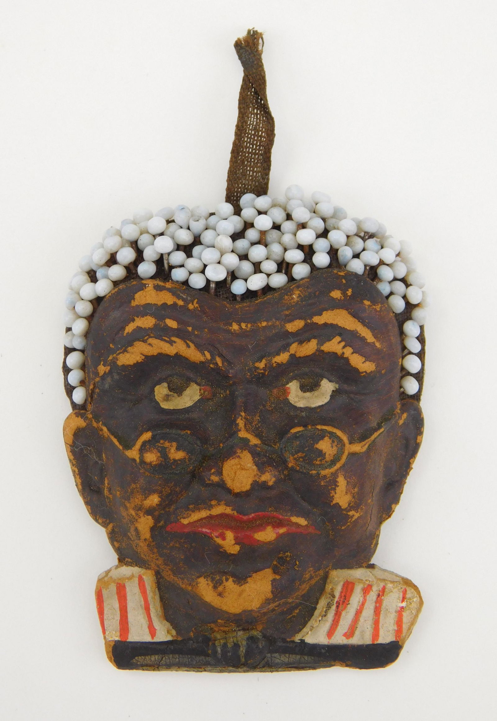 African American composition pin holder (1 of 3)