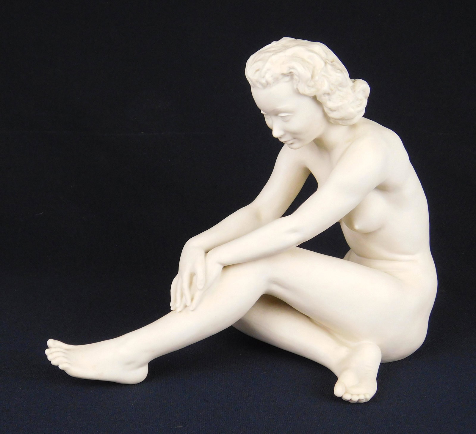 Hutschenreuther bisque porcelain figurine: Hutschenreuther bisque porcelain figurine Seated Nude, marked on bottom, also incised C. Werner on bottom. 9''h