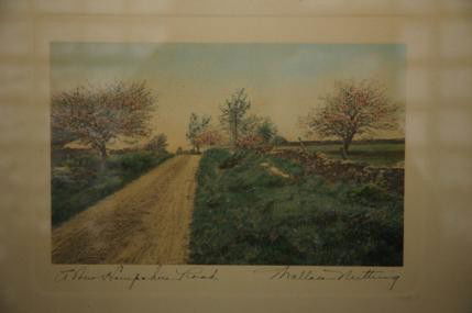 Wallace Nutting photograph: Wallace Nutting- ''A New Hampshire Road''- hand-tinted photograph, signed and titled in pen on the mount, paper age toned. 6 x 9 1/2''