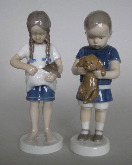 2 Bing & Grondahl Porcelain figurines: 2 Bing & Grondahl porcelain figurines- Boy with Puppy, Girl with Kitten, both marked on bottom, very good condition. 6 1/2'' ea.