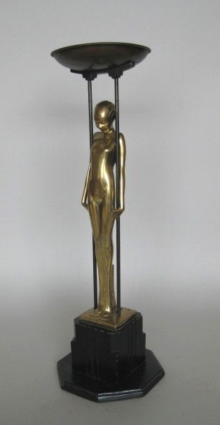 Frankart Inc. standing ashtray: Frankart Inc.- standing ashtray with gold copper finish, base has chipping in black paint, minor scuffs and soiling on copper paint, ashtray is tarnished, good condition. 22 3/4'' H Included with cera