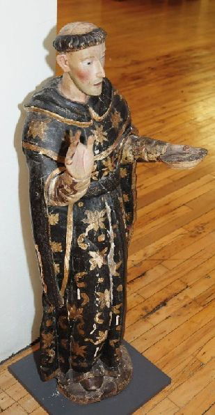 Mexican statue of St. Francis: Mexican gessoed and painted wood staute of St. Francis of Assisi, ca. 1930's, some splitting to wood, chips and paint loss. 42 1/2''
