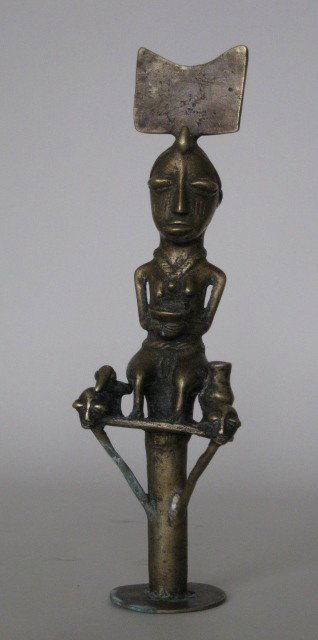 Yoruba Nigeria Oshe Shango Dance Wand: Yoruba Nigeria Oshe Shango Dance Wand- brass, held by devotee or priestess during spirit possession dances with the thunder god Shango, image features seated female with double celt, bird devouring he