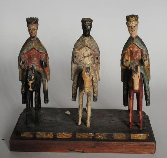 Peurto Rican santos: Puerto Rican santos of the three wise man, carved and painted wood, ca. 1890's, carver identified as Florencio Caban. Note:hands missing, cracks and paint flaking. 7 1/4 x 8 1/2 x 3 3/4''