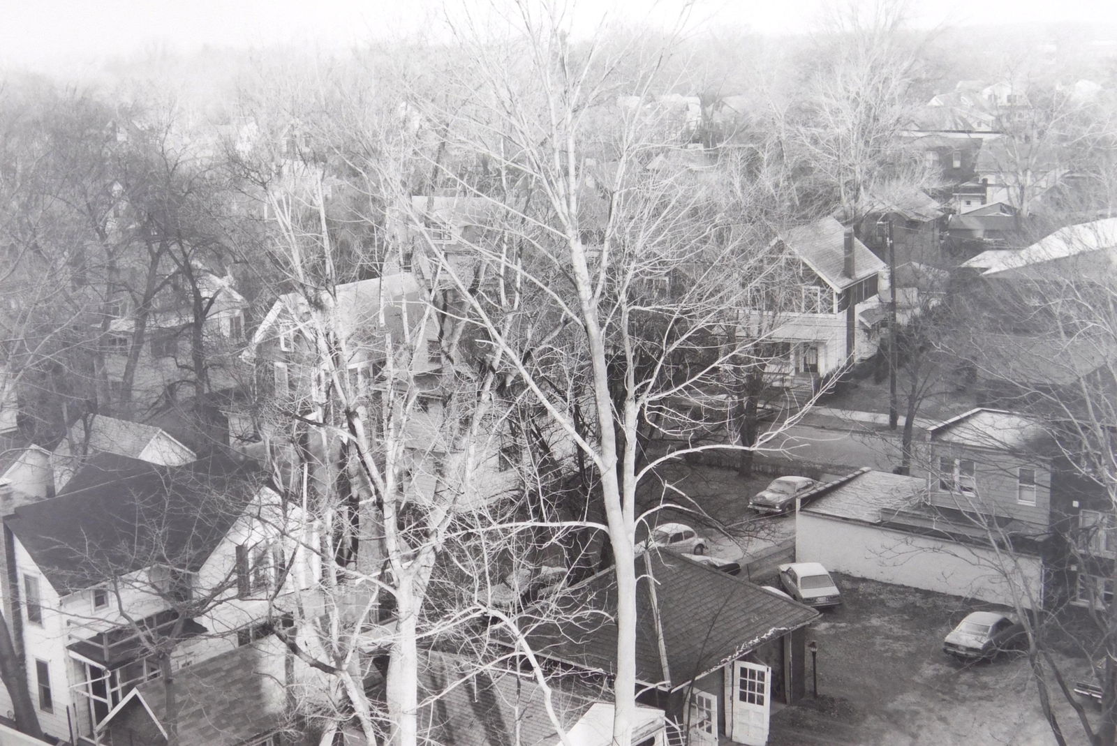 Lee Friedlander photograph: Lee Friedlander (American 1934- ) ''Akron, OH'' gelatin silver print, 1979-80, signed in pencil with copyright stamp- verso, very good condition. 11 x 14'' Illustrated: Friedlander, Lee- ''Factory Val
