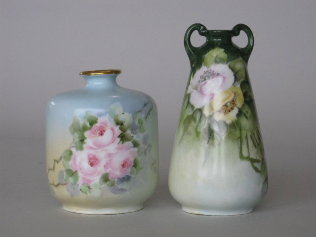 2 Bavarian porcelain vases: 2 Bavarian porcelain vases with hand-painted floral decoration, marked R. C. Bavaria & P. M. Bavarian on bottom, good condition. 6''and 5''h