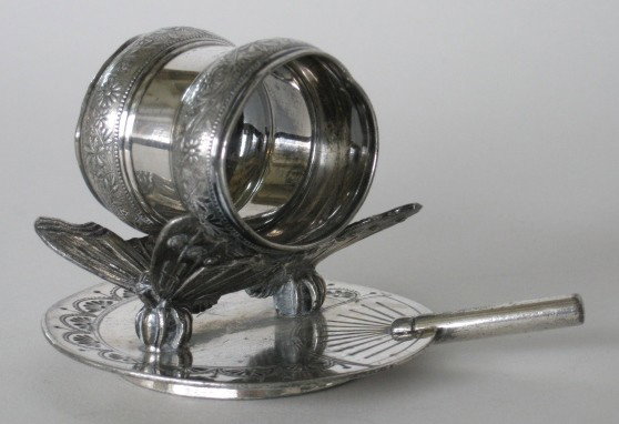 Pair of Meriden napkin rings: Pair of Meriden B. Co. Victorian silver plate napkin rings, decorated with butterflies and fans, marked Meriden B. Co. 209, some scratches and tarnishing from use otherwise very good condition, variou