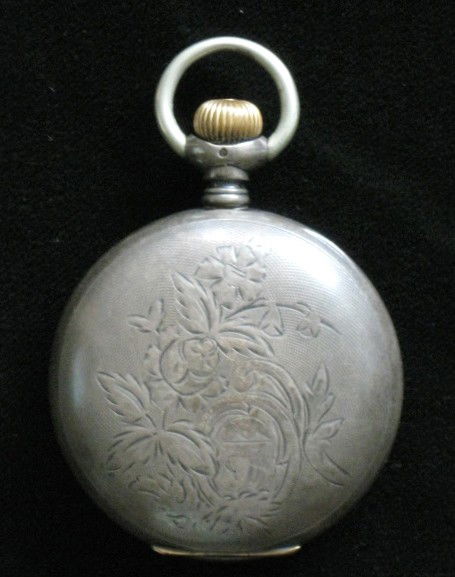 Elgin pocket watch and Omega watch: Elgin pocket watch- case # 1268087 together with a man's Omega watch with stretch band, 14 k.