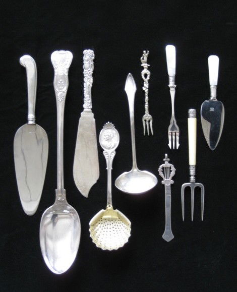 10 silver serving utensils: 10 serving utensils, some hall marked, good condition.