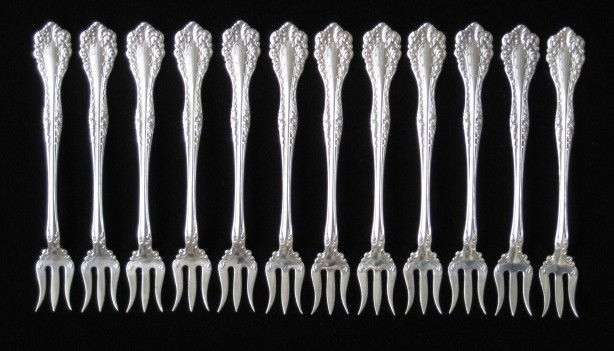 12 Sterling silver shrimp forks: Set of 12 Alvin sterling silver shrimp forks, marked sterling, minor wear from use. 7 oz. (English ounces) 5 1/4''