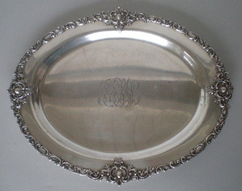 Theodore B. Starr sterling silver tray: Theodroe B. Starr sterling silver serving tray, monogrammed, marked on bottom, some wear from use. 12 x 9 1/2'' (o) 17.4 oz. (English ounces)