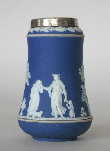Wedgwood jasperware vase: Wedgwood jasperware vase, white classical figures on a deep blue ground with a silver mount around neck, marked Wedgwood on base. 5 1/4''h