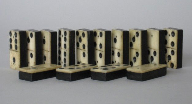 Set of American ebony and ivory dominoes: Set of 14 mid 19th c. American ebony and ivory dominoes, some minor chipping from use otherwise good condition.