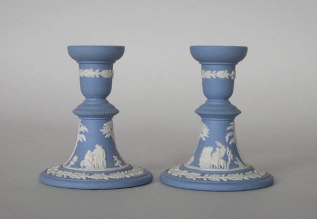 Pair of Wedgwood jasperware candlesticks: Pair of Wedgwood jasperware candlesticks, classical figures on a blue ground, marked, very good condition. 4 7/8h