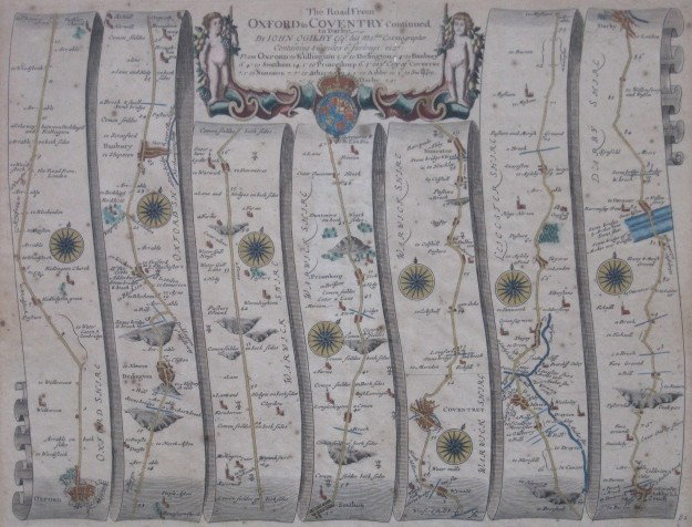 John Ogiley hand-colored map- 18th c.: John Ogiley- ''The Road From Oxford to Coventry- hand-colored map, fold down center as should be, some staining and foxing throughout. 15 x 18''