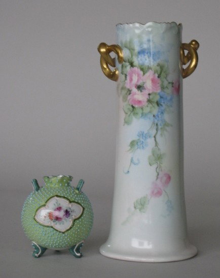 Astrian and Nippon porcelain vase: Austrian vase together with Nipppon 3 footed vase, both hand painted with floral decoration, 1 stamped'Vienna, Austria', good condition. 9 7/8'', 3 1/2''