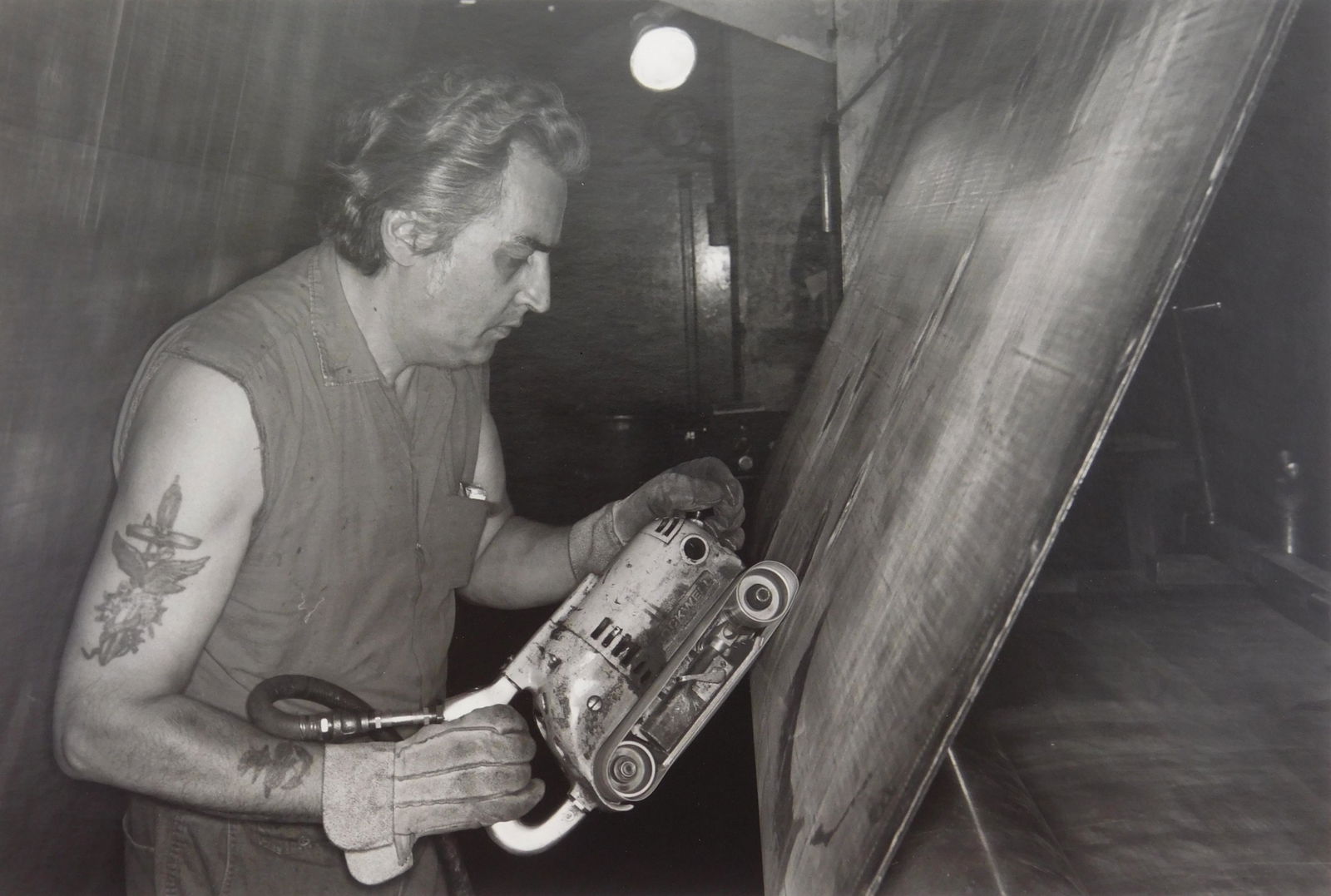 Lee Friedlander gelatin silver print: Lee Friedlander (American 1934- ) ''Akron, OH''- gelatin silver print, 1979-80, signed in pencil with copyright stamp- verso, very good condition. 11 x 14'' Illustrated: Friedlander, Lee- ''Factory Va