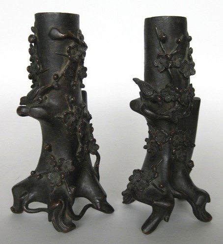 Pair of Japanese bronze spill vases: Pair of Japanese bronze spill vases- tree trunk form with flowering vines and birds, very good condition. 9 1/2''h
