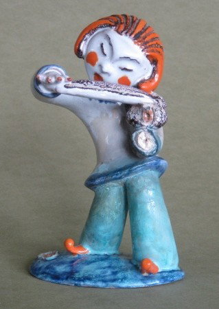 Austrian ceramic figurine: Austrian ceramic figurine- violinist, possibly Werner Werkstatte, as is condition. 6 3/4''h