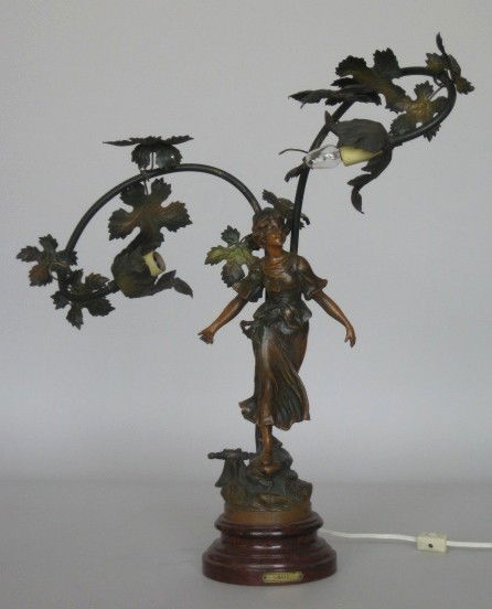 Art Nouveau white metal figural lamp: Art Nouveau white metal figural lamp- Young maiden on bough of vines, some nicks and loss. 17 1/2''h