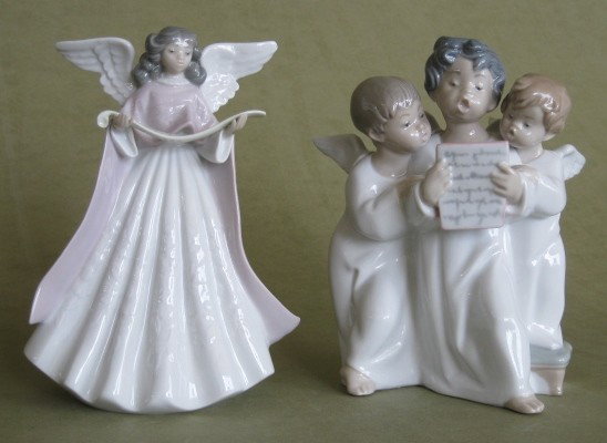 2 Lladro porcelain figurines: 2 Lladro porcelain figurines- ''Group of Angels'' (4542); ''Angel Christmas Tree Topper''- both marked on bottom, very good condition. 7'', 7 1/2''h