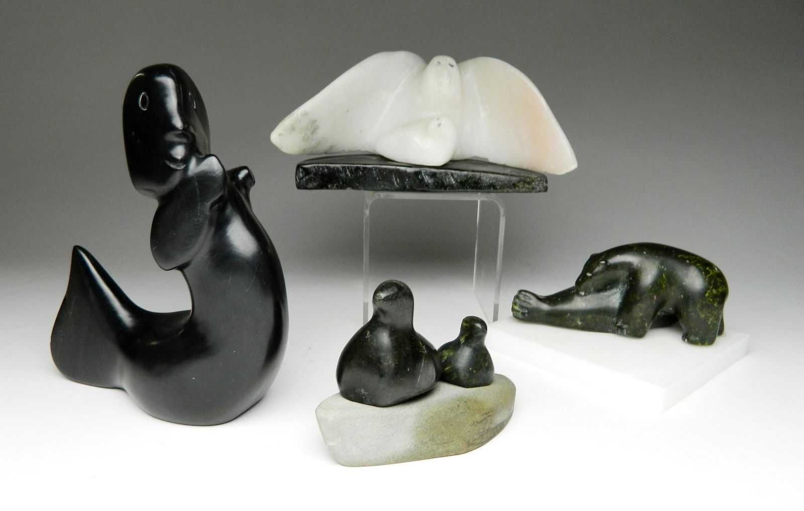 4 Inuit stone carvings (1 of 2)