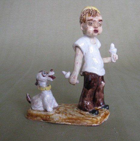 Dorothy S. Harkins ceramic sculpture: Dorothy S. Harkins- Boy and Dog with Ice Cream Cones- ceramic sculpture, signed Harkins on bottom, one small glaze chip at base. 6 1/4''h