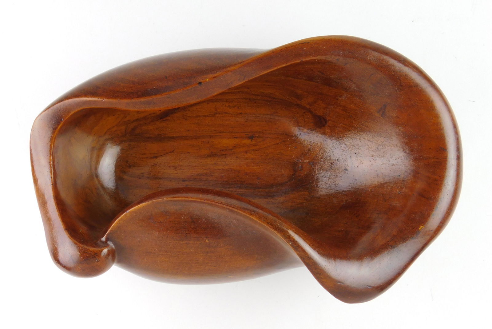 Russel Wright 'Oceana' Wave salad bowl: Russel Wright 'Oceana' Wave salad bowl, Model #54 in Claro walnut, 1935-1940, manufactured by Klise Wood Working Company of Grand Rapids, MI. original paper label and signed with burned mark. 13 1/4 x