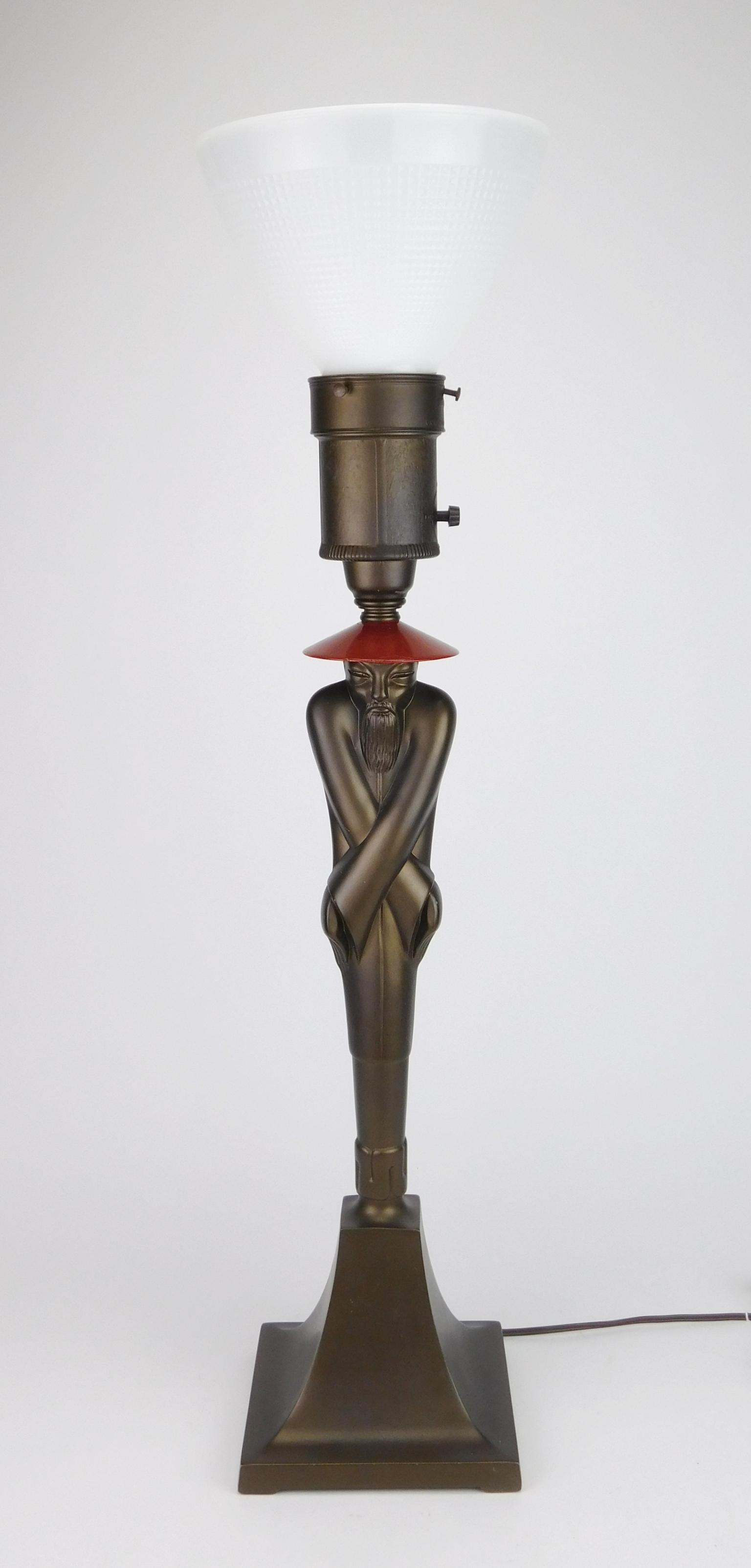 Colonial Premier Co. table lamp: Colonial Premier Co. 'Chinaman' table lamp, 1930-1940's, original chrome with red bakelite/catalin pull-knob and bakelite rings at bottom and top. 31''h with shade