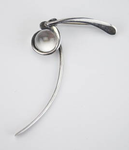 Art Smith ster1ing silver brooch: Art Smith (American 1917-1982)- ''Lady Day'' sterling silver brooch, double articulating sickle design with trapped sphere, 1955-1969, impressed mark. 4 1/4''l