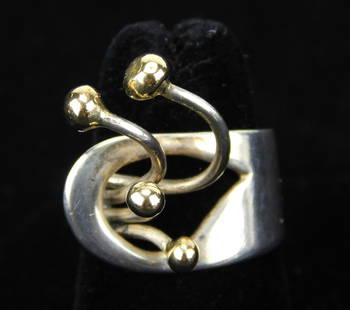 Art Smith sterling silver ring: Art Smith (1917-1982) sterling silver ring, 1950-1960's, abstract and geometric design with the classic ball ends and brass round ends for opposing design. Size: 6 1/4