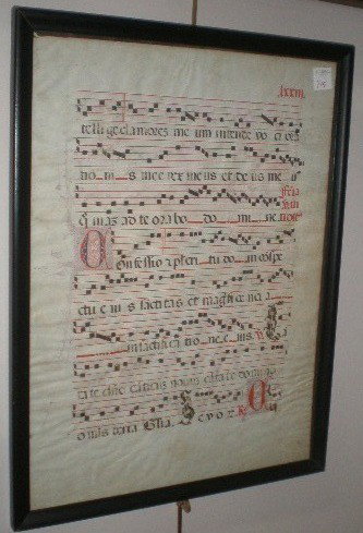 Spanish musical manuscript page: Spanish musical manuscript page- watercolor on vellum, some staining throughout. 20 x 14 1/2''