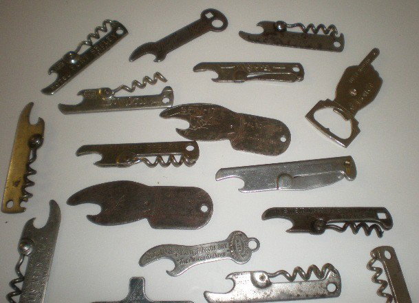 15+ Promotional flat bottle openers: 15+ Promotional flat bottle openers- hotels, beer, etc.- fair condition, various sizes.
