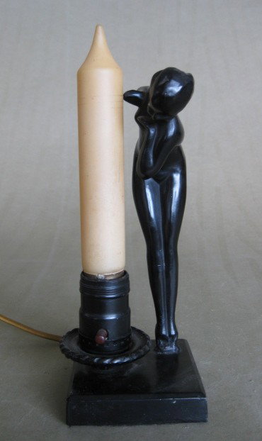 Frankart 'Peek-A-Boo' figure lamp: Frankart 'Peek-A-Boo' figure lamp, L208- candlite bulb, black finish, marked, nicks to finish. 8''h